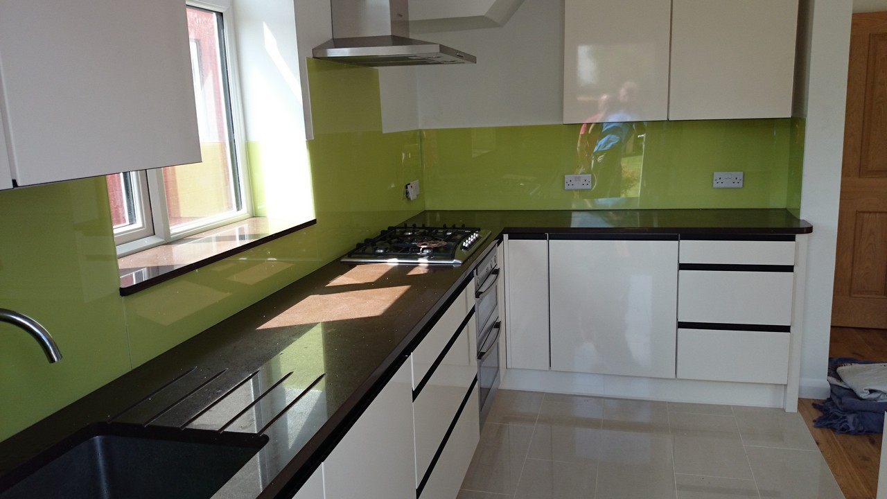 Lime green glass kitchen splashback installed by Charlton glaziers